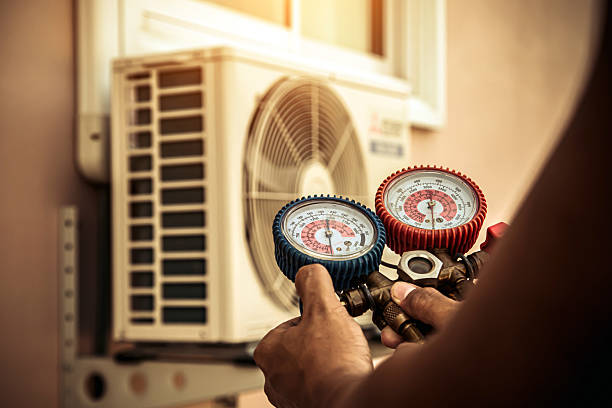 Professional Heat Pump Repair technician working in Centerville, UT
